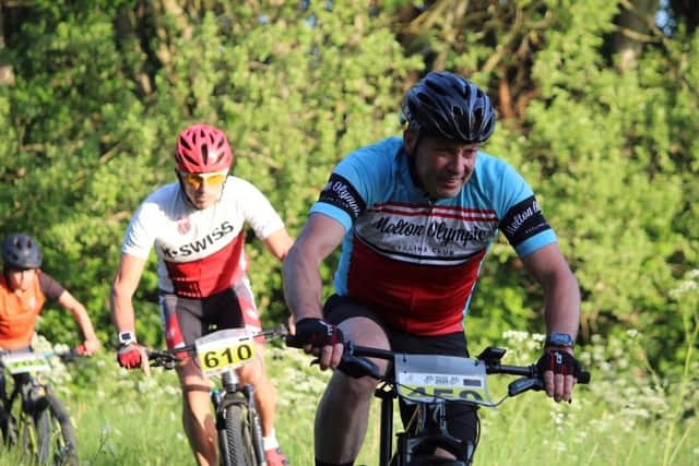 Cyclists riding hard in the race at Melton Country Park