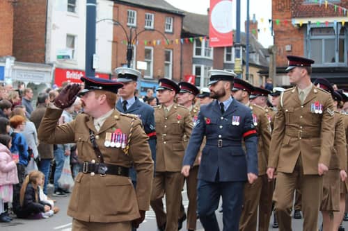 A recent Remembrance Sunday parade passes through Market Place in Melton Mowbray