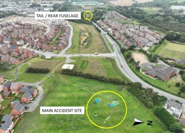 An aerial picture showing the glider crash site in Melton in August 2023 and the location where the tail and rear fuselage fell to