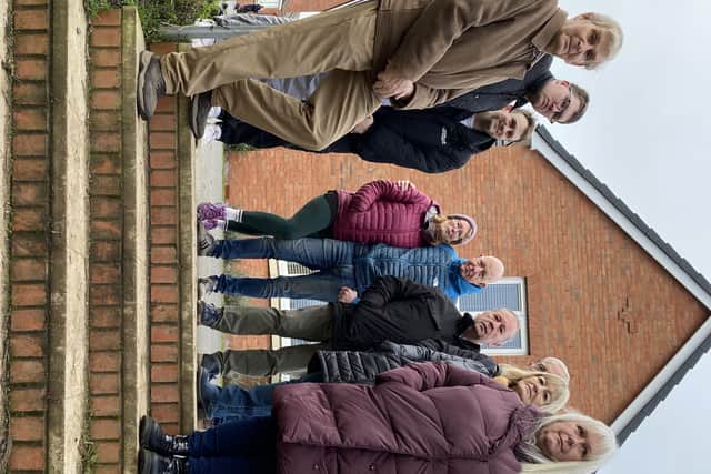Councillor Sarah Cox with residents at the top of the steps leading from Roman Gate to Gilpin Close in Melton