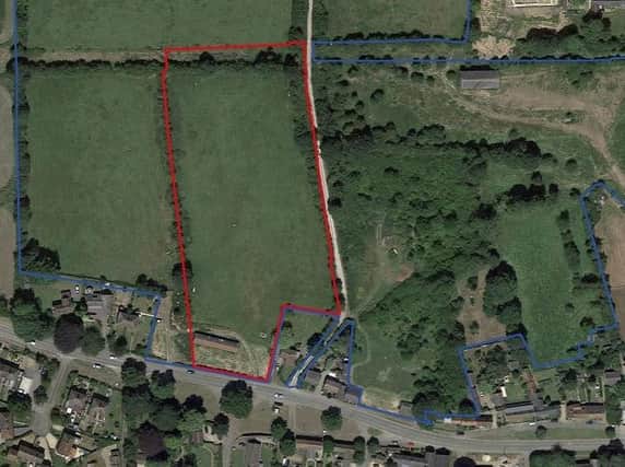 The Main Street site (bounded in red) at Wymondham where 24 new homes could be built