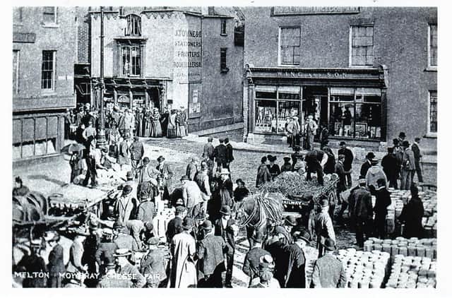 A cheese fair held in Melton Mowbray town centre in yesteryear