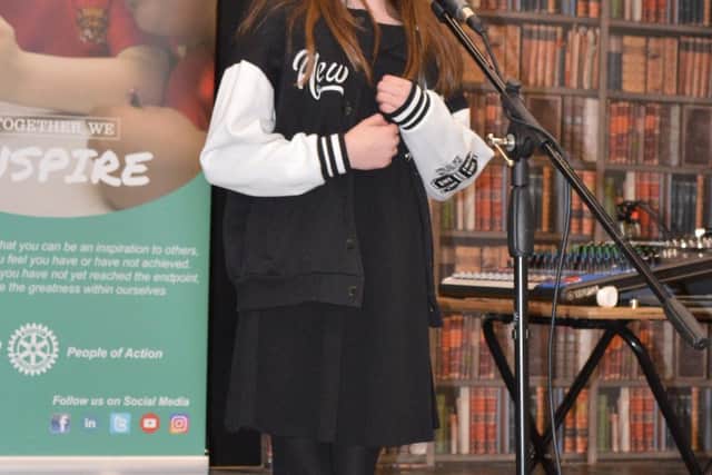 Intermediate vocalist winner, Esme Buckle, sings in the Melton heat of the Rotary Young Musician contest