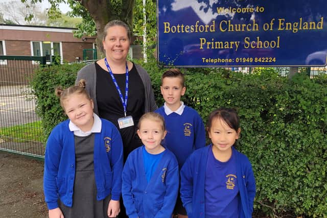 Staff and pupils at Bottesford CE Primary School