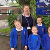 Head teacher Emma Barker with some of her pupils at Bottesford CE Primary School