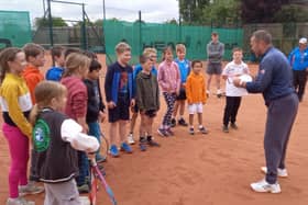 Danny Sapsford coaches youngsters at Melton Tennis Club.