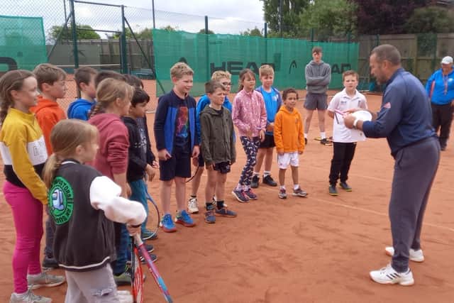 Danny Sapsford coaches youngsters at Melton Tennis Club.