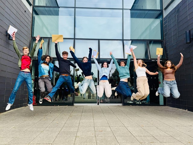 Students jump for joy.