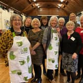 Some members of the Wymondham WI celebrate their centenary in the village hall