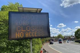 A sign on Norman Way advertising the A607 closure with the left hand lane reopened again to traffic heading to Thorpe Road