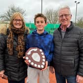 Reg and Jennie Hughes present Ben England with his Shane Hughes Shield.