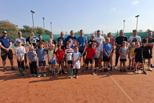 Parents and children at Melton Tennis Club's annual tournament.