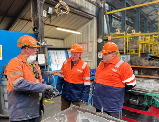 Mayor of Melton, Councillor Peter Faulkner (right), with Deputy Mayor, Councillor Alan Hewson (centre) pictured during their visit to Holwell Works