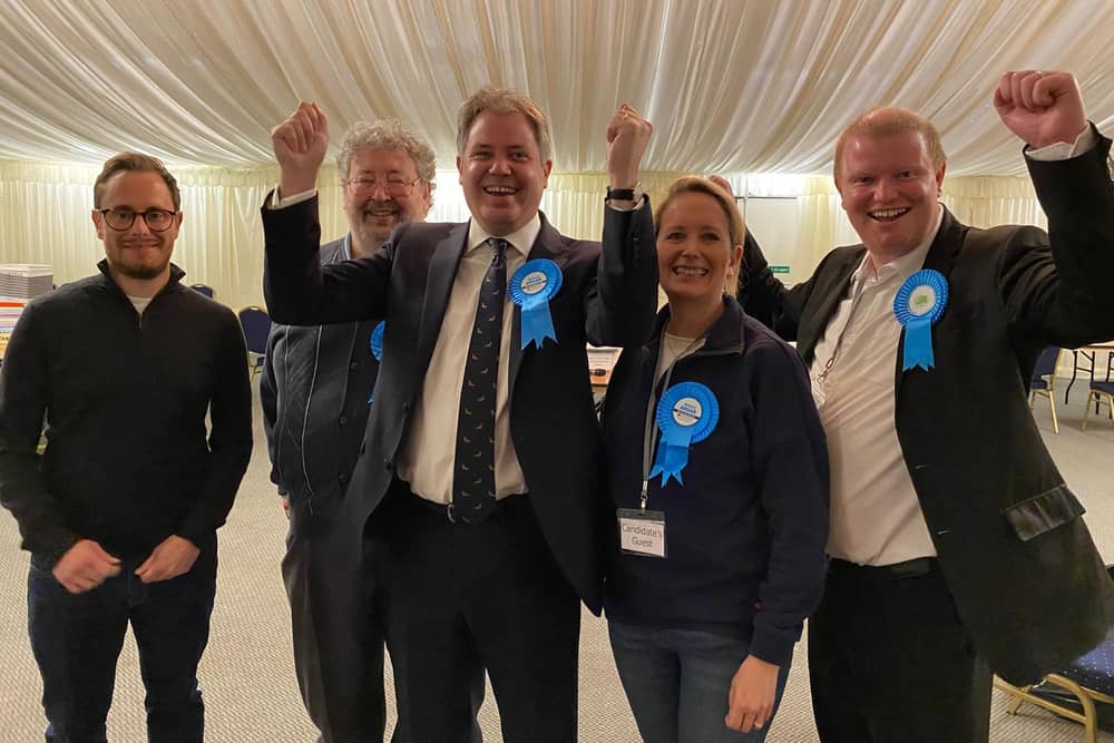 Edward Argar celebrates with his supporters after being elected MP for Melton & Syston early this morning