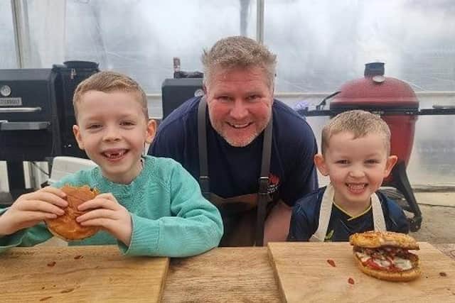 Youngsters enjoying burgers with Matthew Hoggard at his Hoggy's Grill business
