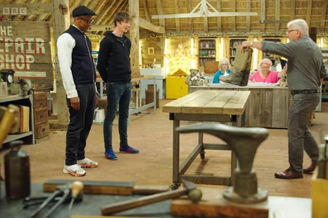 Malcom Britton deliver his father's boots to Jay Blades and Dean Westmoreland during his appearance on The Repair Shop