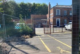 The reopened gate allowing passengers to use the footpath from Melton railway station leading around the back of the borough council offices