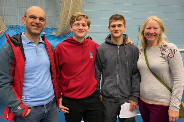 Fred and George Gil with their parents Joe and Pippa on GCSE results day at Long Field