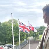 Councillor Joseph Boam, deputy leader of Leicestershire County Council, pictured with flags at County Hall