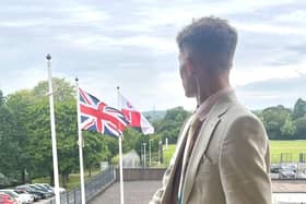 Councillor Joseph Boam, deputy leader of Leicestershire County Council, pictured with flags at County Hall
