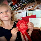 Bow Woods was awarded Stathern Village Show's Shirley Keir Cup for Children’s Best in Show for her painting of the bell tower.