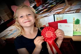 Bow Woods was awarded Stathern Village Show's Shirley Keir Cup for Children’s Best in Show for her painting of the bell tower.