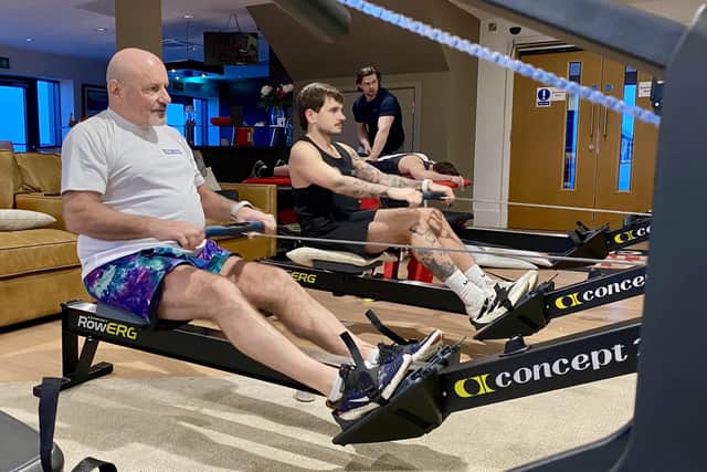 Greg Elliott taking part in the row-athon at the Get Busy Living Centre