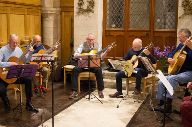Some members of the Melton-based classical guitar group who will be hosting a free workshop