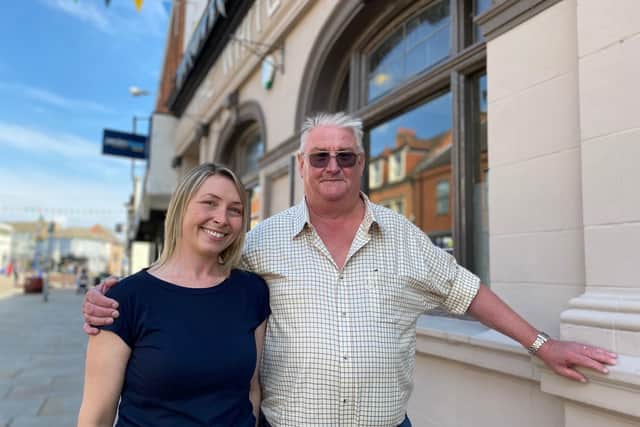 Operations manager, Michelle Gurski and Heineken business development manager, Simon Beal, prepare for the reopening of The White Lion pub in Melton Mowbray