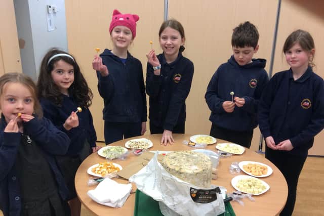 Long Clawson Primary School pupils enjoy sampling cheeses at their special workshop with Long Clawson Dairy