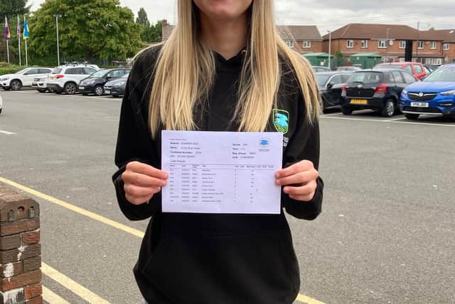 Emily Gilder shows off her GCSE results at Long Field Spencer Academy