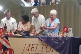 Stephen Hallam (left) demonstrates the art of hand-raising a Melton Mowbray pork pie at this year's PieFest event at the weekend
PHOTO Karl Matlock