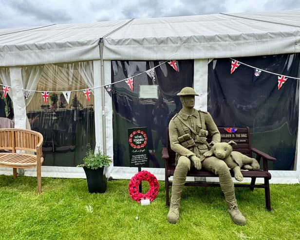 Staff and patients gathered in the Secret Garden for a VE Day-themed tea party