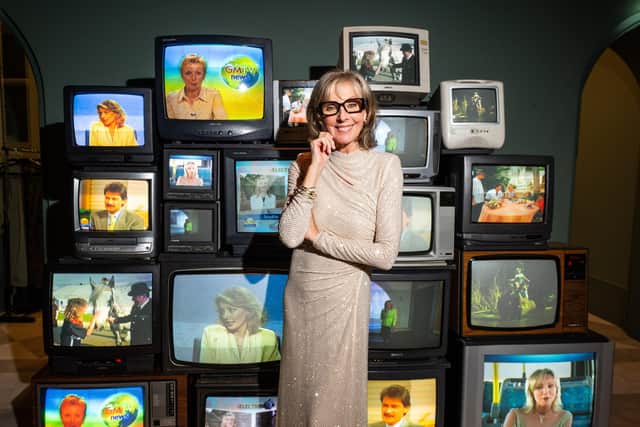 Anne Davies in front of images showing some of her previous TV appearances