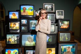 Anne Davies in front of images showing some of her previous TV appearances