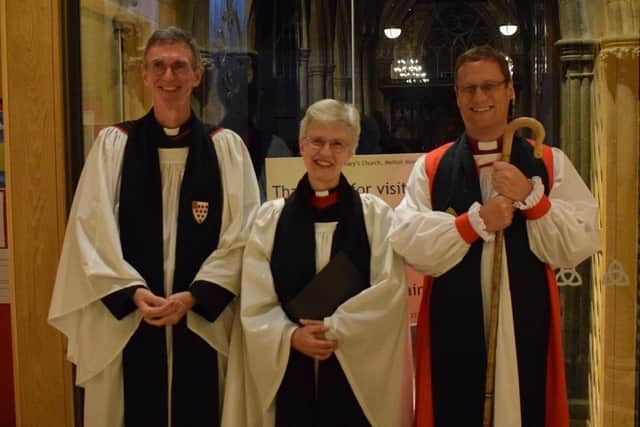 Rev Mary Barr with her husband, the Rev Canon John Barr (left), and Bishop of Leicester, the Rt Rev Martyn Snow, at last night's ceremony at St Mary's, Melton
PHOTO PHIL BALDING