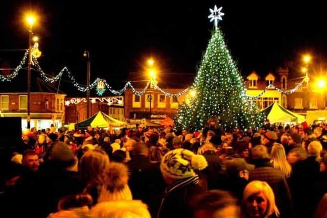 The Christmas lights are switched on in Melton Market Place a few years ago