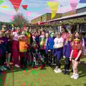 Students and staff enjoying the Colour Walk event at Birch Wood and Sherard Schools IMAGE Grace Croxall