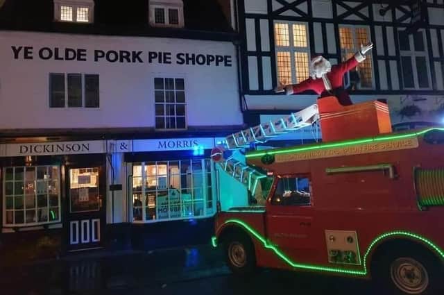 Santa aboard the Trumpton Fire Engine organised every Christmas by Melton firefighters