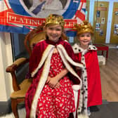Lola (6) and her four-year-old sister, Rosie, dress like The Queen at Melton Carnegie Museum