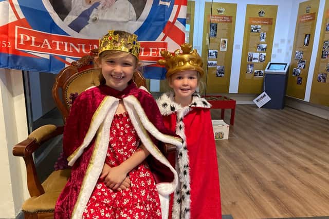 Lola (6) and her four-year-old sister, Rosie, dress like The Queen at Melton Carnegie Museum