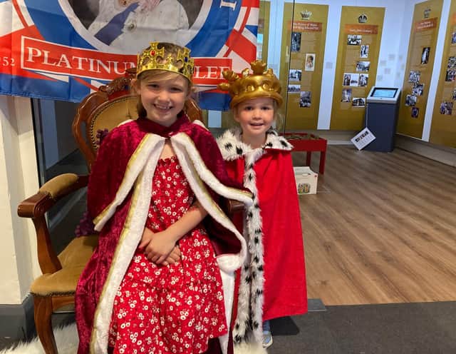 Lola (6) and her four-year-old sister, Rosie, dress like The Queen at Melton Carnegie Museum