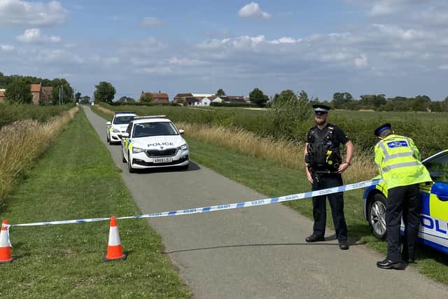 A police roadblock in Canal Lane, Stathern, yesterday as officer investigated an incident at a summer camp