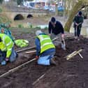 MOWS volunteers lay the path to the River Eye at the new rowing boat hire base in Wilton Park, Melton