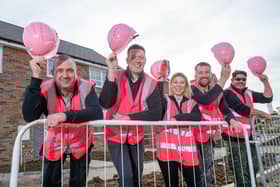 The site team at Barratt Homes' King’s Meadow, off Kirby Lane, Melton, dressed in bright pink hats and vests for the Breast Cancer Now 'Wear it pink' campaign