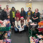 Some of the volunteers who helped collect food for hundreds of Christmas hampers for struggling people across the Melton borough