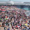 Crowds flock to Sussex beach as temperatures soar.