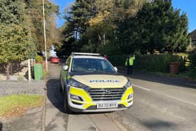 Police at the scene of this morning's collision in Scalford Road, Melton, which involved two schoolgirls and a car
PHOTO GEORGE ICKE