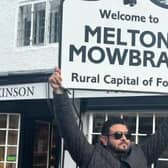 Adam Richman pictured during his visit to Ye Olde Pork Pie Shoppe in  Melton Mowbray where he sampled Melton pork pies for his TV show
