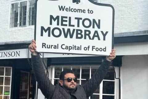 Adam Richman pictured during his visit to Ye Olde Pork Pie Shoppe in Melton Mowbray where he sampled Melton pork pies for his TV show